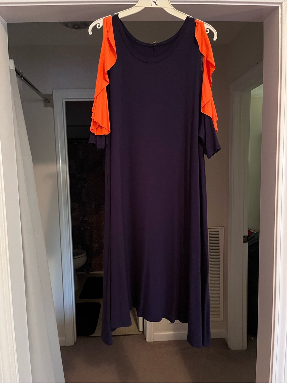 Blue dress with orange ruffles